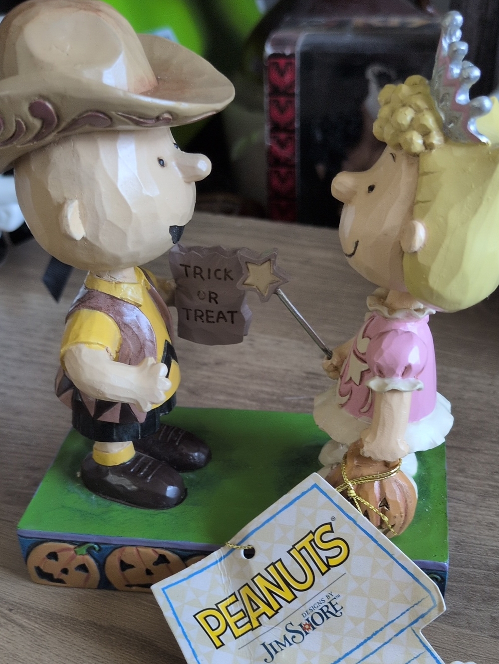 Peanuts Jim Shore Yellow & Pink Trick-or-Treat Figurine